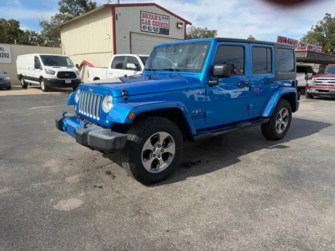 Blue 2016 JEEP WRANGLER UNLIMI SAHARA for sale in Chickasha, OK