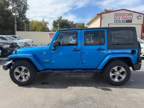 Photos of 2016 JEEP WRANGLER UNLIMI SAHARA for sale in Chickasha, OK at Bryan's Car Corner Chickasha
