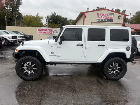 Photos of 2016 JEEP WRANGLER UNLIMI SAHARA for sale in Chickasha, OK at Bryan's Car Corner Chickasha