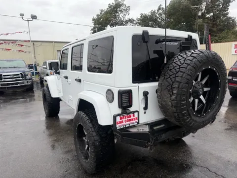 Another view of 2016 JEEP WRANGLER UNLIMI SAHARA for sale in Chickasha, OK at Bryan's Car Corner Chickasha