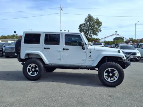 Photos of 2013 JEEP WRANGLER UNLIMI SAHARA for sale in Chickasha, OK at Bryan's Car Corner Chickasha