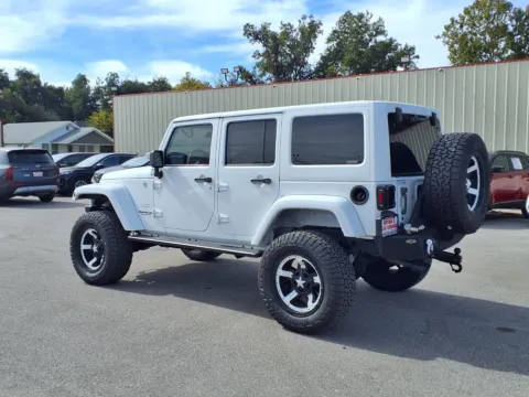 Another view of 2013 JEEP WRANGLER UNLIMI SAHARA for sale in Chickasha, OK at Bryan's Car Corner Chickasha