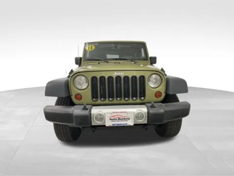 Photos of 2013 Jeep Wrangler Sahara for sale in Webster, NY at Auto Outlets of Webster