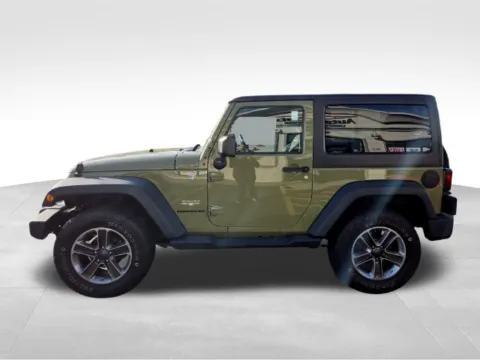 More photos of 2013 Jeep Wrangler Sahara at Auto Outlets of Webster, NY