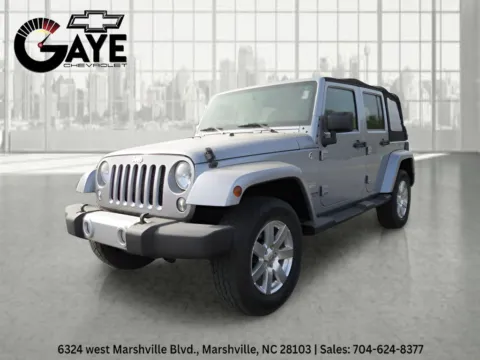 Silver 2015 Jeep Wrangler Sahara for sale in Marshville, NC