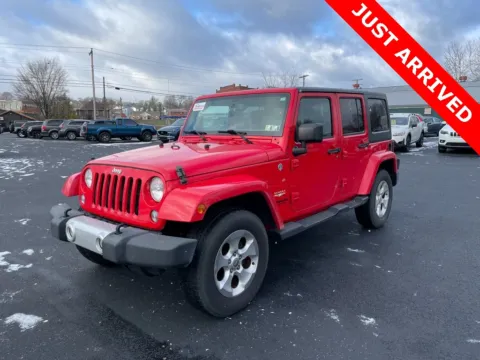 Red 2015 Jeep Wrangler Unlimited Sahara for sale in DuBois, PA