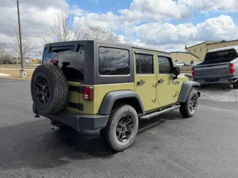 Another view of 2013 Jeep Wrangler Unlimited Sport for sale in DuBois, PA at Kurt Johnson Auto Sales & Service