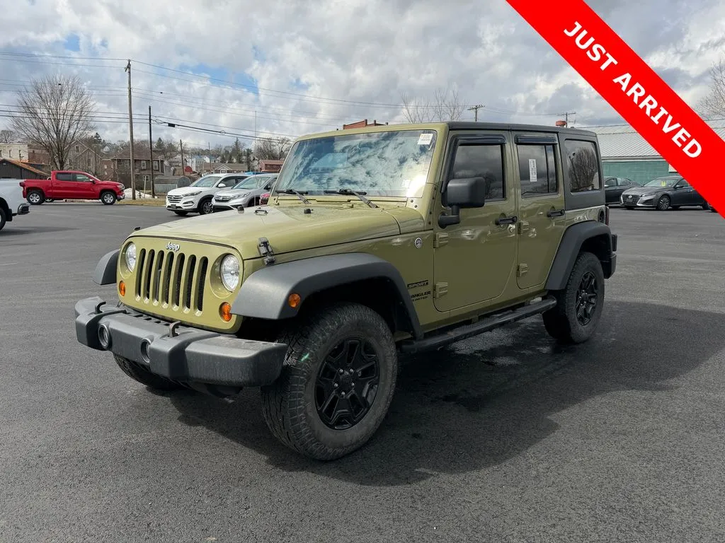 Green 2013 Jeep Wrangler Unlimited Sport for sale in DuBois, PA