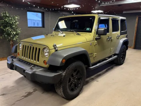 Green 2013 Jeep Wrangler Unlimited Sport for sale in DuBois, PA