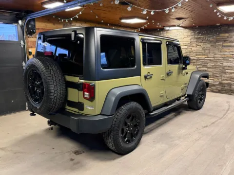 Another view of 2013 Jeep Wrangler Unlimited Sport for sale in DuBois, PA at Kurt Johnson Auto Sales & Service