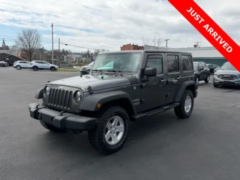 Gray 2016 Jeep Wrangler Unlimited Sport for sale in DuBois, PA