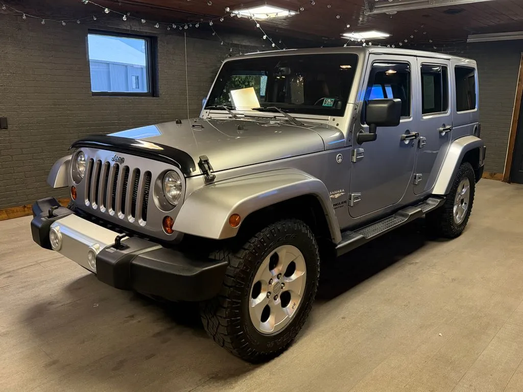 Silver 2013 Jeep Wrangler Unlimited Sahara for sale in DuBois, PA