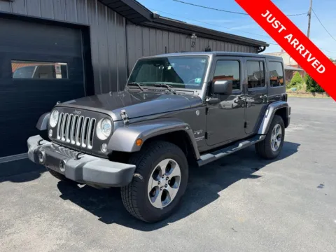 Gray 2017 Jeep Wrangler Unlimited Sahara for sale in DuBois, PA
