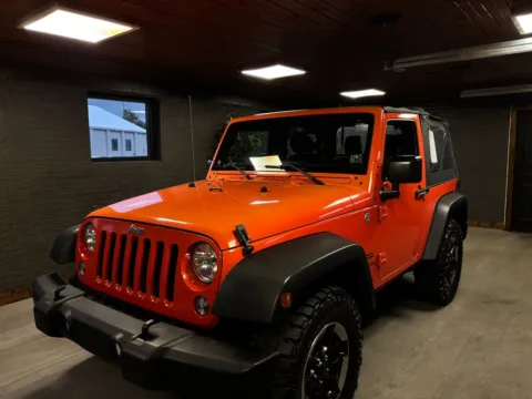 Orange 2015 Jeep Wrangler Sport for sale in DuBois, PA