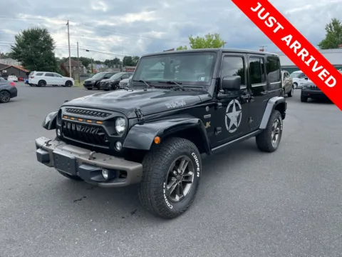 Black 2016 Jeep Wrangler Unlimited Sahara for sale in DuBois, PA
