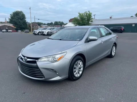 Red 2017 Toyota Camry Hybrid LE for sale in DuBois, PA