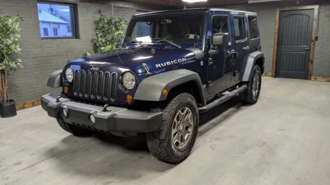 Blue 2013 Jeep Wrangler Unlimited Rubicon for sale in DuBois, PA