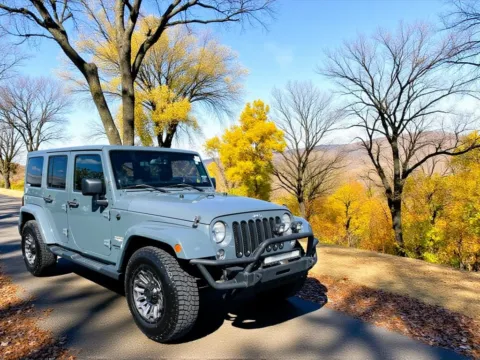 Gray 2014 Jeep Wrangler Unlimited Sahara for sale in DuBois, PA