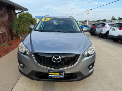 Photos of 2013 MAZDA CX-5 GRAND TOURING for sale in Cedar Rapids, IA at Road Runner Auto Sales and Service