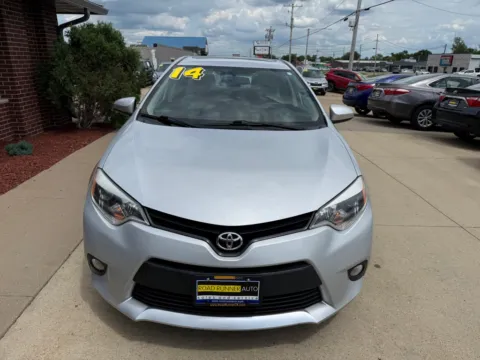 Photos of 2014 TOYOTA COROLLA LE PLUS for sale in Cedar Rapids, IA at Road Runner Auto Sales and Service