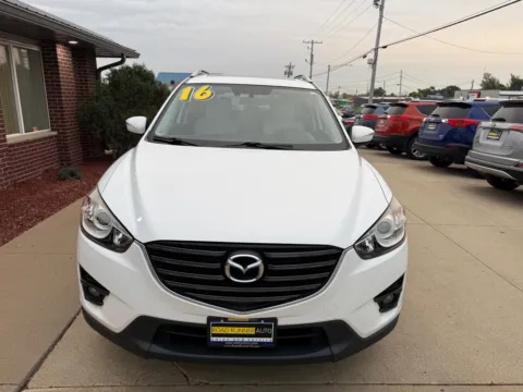Photos of 2016 MAZDA CX-5 GRAND TOURING for sale in Cedar Rapids, IA at Road Runner Auto Sales and Service