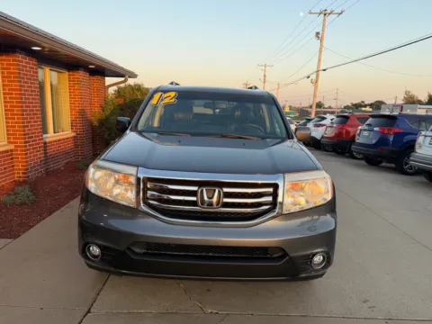 Photos of 2012 HONDA PILOT EXL for sale in Cedar Rapids, IA at Road Runner Auto Sales and Service