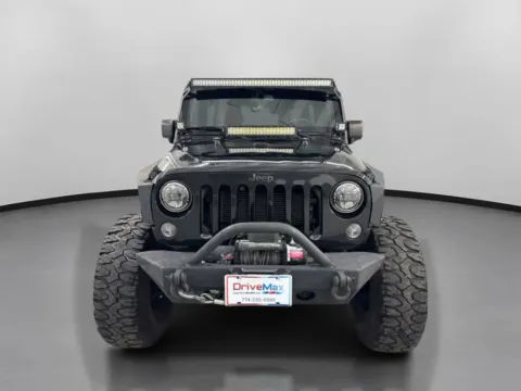 Photos of 2015 Jeep Wrangler Unlimited Sport S SUV 4D for sale in West Bridgewater, MA at DriveMax (Auto Center Sales and Service)