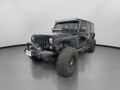 More photos of 2015 Jeep Wrangler Unlimited Sport S SUV 4D at DriveMax (Auto Center Sales and Service), MA