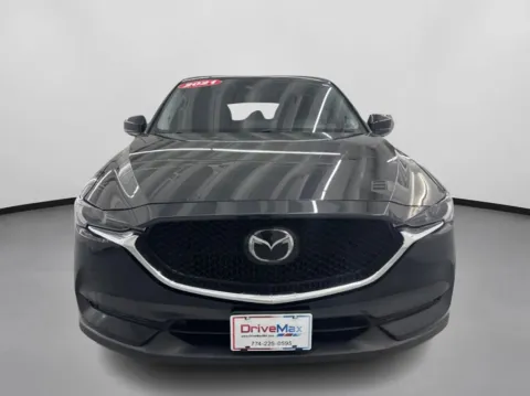 Photos of 2021 MAZDA CX-5 Grand Touring Sport Utility 4D for sale in West Bridgewater, MA at DriveMax (Auto Center Sales and Service)