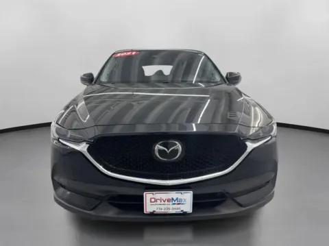 Photos of 2021 MAZDA CX-5 Grand Touring Sport Utility 4D for sale in West Bridgewater, MA at DriveMax (Auto Center Sales and Service)