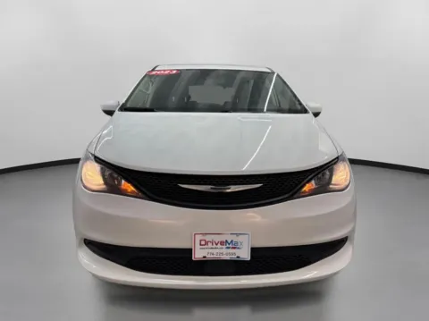 Photos of 2023 Chrysler Voyager LX Van 4D for sale in West Bridgewater, MA at DriveMax (Auto Center Sales and Service)