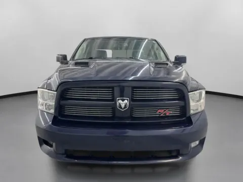 Photos of 2012 Ram 1500 Quad Cab Sport Pickup 4D 6 1/3 ft for sale in West Bridgewater, MA at DriveMax (Auto Center Sales and Service)