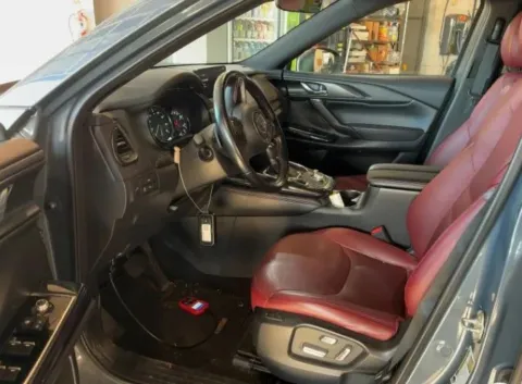 Another view of 2023 MAZDA CX-9 Carbon Edition Sport Utility 4D for sale in West Bridgewater, MA at DriveMax (Auto Center Sales and Service)