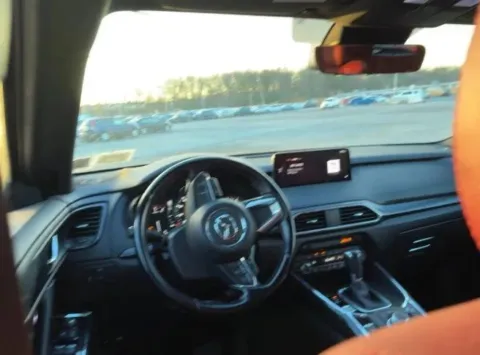 Another view of 2023 MAZDA CX-9 Carbon Edition Sport Utility 4D for sale in West Bridgewater, MA at DriveMax (Auto Center Sales and Service)