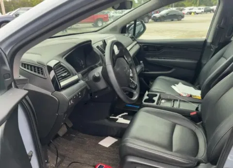 Photos of 2023 Honda Odyssey Touring Minivan 4D for sale in West Bridgewater, MA at DriveMax (Auto Center Sales and Service)