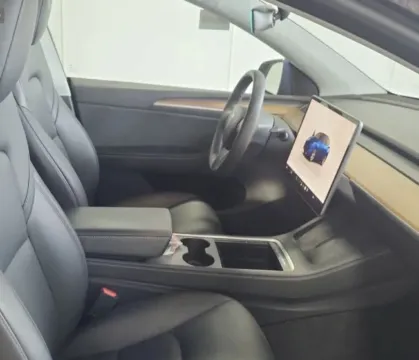 Photos of 2023 Tesla Model Y Long Range Sport Utility 4D for sale in West Bridgewater, MA at DriveMax (Auto Center Sales and Service)