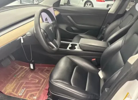 Photos of 2021 Tesla Model 3 Standard Range Plus Sedan 4D for sale in West Bridgewater, MA at DriveMax (Auto Center Sales and Service)