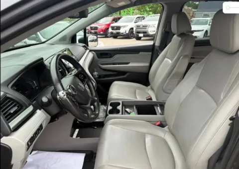 Photos of 2019 Honda Odyssey Touring Minivan 4D for sale in West Bridgewater, MA at DriveMax (Auto Center Sales and Service)