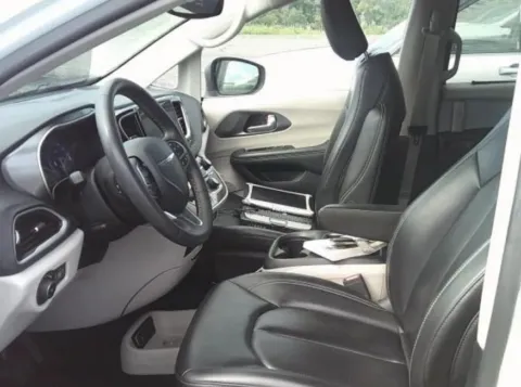 Photos of 2023 Chrysler Pacifica Touring L Van 4D for sale in West Bridgewater, MA at DriveMax (Auto Center Sales and Service)