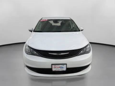 Photos of 2023 Chrysler Voyager LX Van 4D for sale in West Bridgewater, MA at DriveMax (Auto Center Sales and Service)