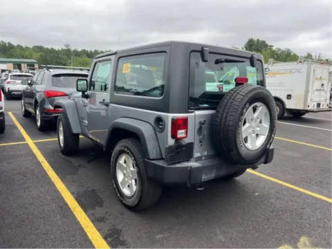 Another view of 2017 Jeep Wrangler Sport SUV 2D for sale in West Bridgewater, MA at DriveMax (Auto Center Sales and Service)