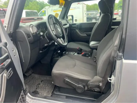 Photos of 2017 Jeep Wrangler Sport SUV 2D for sale in West Bridgewater, MA at DriveMax (Auto Center Sales and Service)