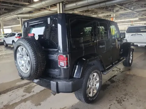 Another view of 2017 Jeep Wrangler Unlimited Sahara Sport Utility 4D for sale in West Bridgewater, MA at DriveMax (Auto Center Sales and Service)