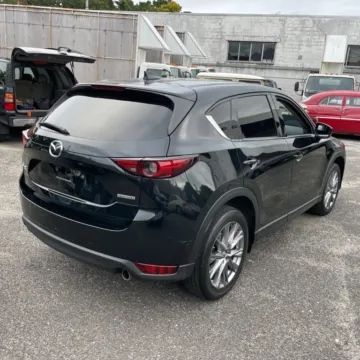 Another view of 2021 MAZDA CX-5 Grand Touring Sport Utility 4D for sale in West Bridgewater, MA at DriveMax (Auto Center Sales and Service)