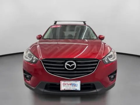 Photos of 2016 MAZDA CX-5 Touring Sport Utility 4D for sale in West Bridgewater, MA at DriveMax (Auto Center Sales and Service)