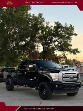 Another view of 2016 Ford F350 Super Duty Crew Cab Platinum Pickup 4D 6 3/4 ft for sale in Midvale, UT at Saint Motors