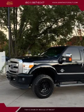 Photos of 2016 Ford F350 Super Duty Crew Cab Platinum Pickup 4D 6 3/4 ft for sale in Midvale, UT at Saint Motors