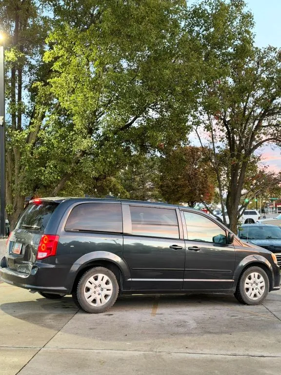 Another view of 2014 Dodge Grand Caravan Passenger SE Minivan 4D for sale in Midvale, UT at Saint Motors