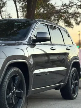 Photos of 2015 Jeep Grand Cherokee Altitude Sport Utility 4D for sale in Midvale, UT at Saint Motors