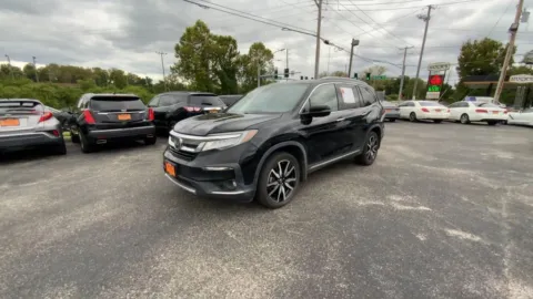 More photos of 2021 Honda Pilot Touring Sport Utility 4D at Mathis Motors, MO